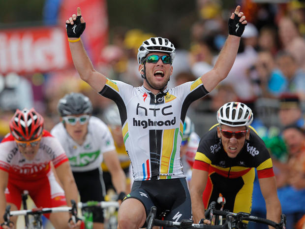 Mark Cavendish of Britain celebrates winning the fifth stage 