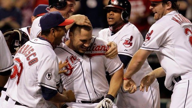 Travis Hafner is mobbed by teammates 