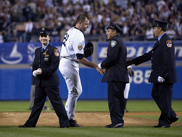 Roger Clemens greets members of the NY police dept. 