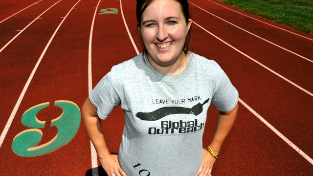 Amy Russell poses for a photograph in Manchester, Conn., July 14, 2011. In January 2012, Russell will embark on a 7,000-mile, two-year trek across Africa in an effort to raise money to help provide clean drinking water for people in underdeveloped countri 