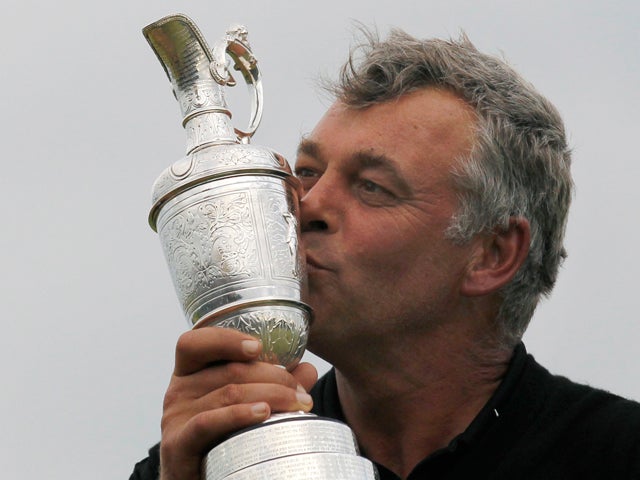 Darren Clarke kisses the Claret Jug 