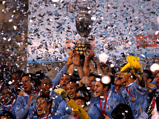 Uruguay's players celebrate holding the Copa America 