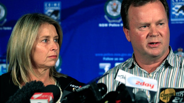 William Pulver makes a statement as his wife Belinda listens in Sydney Aug. 4, 2011, a day after their daughter Madeleine was chained to a fake bomb for 10 hours. Australian police said they believe a masked man broke into the home of the wealthy Sydney f 