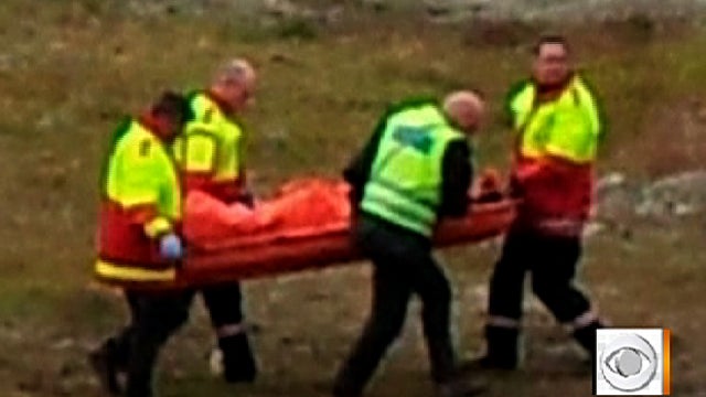 Victim of polar bear attack in Norway that left a camper dead and four others injured is carried to helicopter 