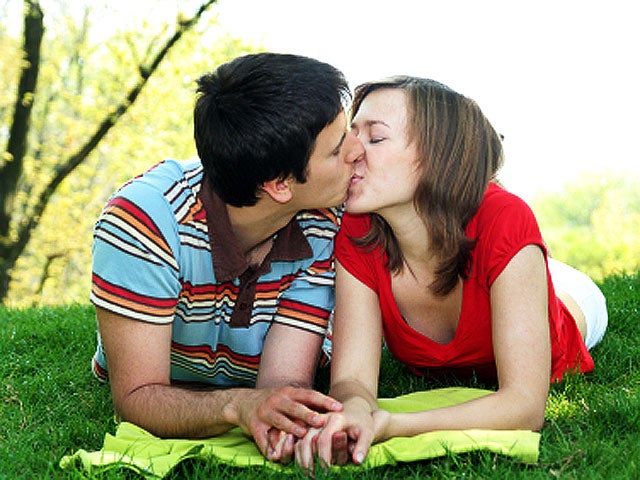young couple, teenagers, kissing, kiss, couple, dating, puppy love, outdoors, stock, 4x3