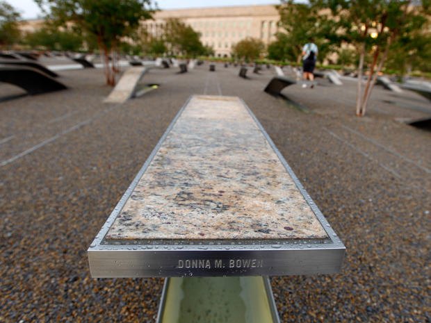 A bench inscribed with the name Donna M. Bowen is seen at the Pentagon Memorial outside the Pentagon in Arlington, Va.  