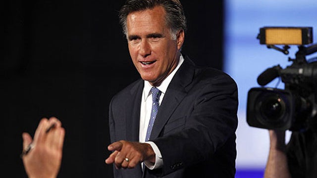 Republican presidential candidate former Massachusetts Gov. Mitt Romney is seen during a commercial break at the Iowa GOP/Fox News Debate at the CY Stephens Auditorium in Ames, Iowa, Aug. 11, 2011. 