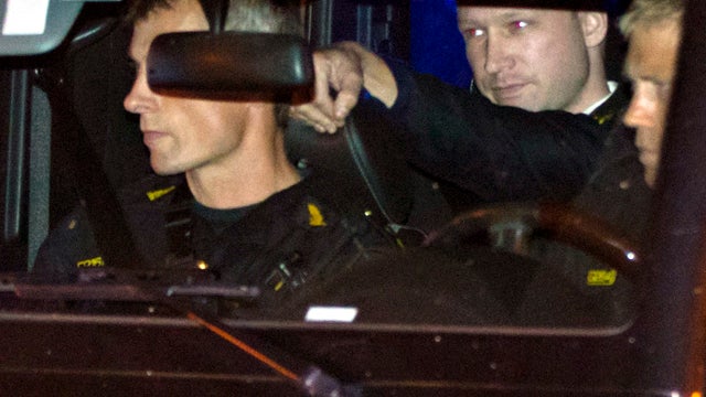 Confessed killer Anders Behring Breivik arrives at court in the back of a police car in Oslo Aug. 19, 2011. He faced a closed-door hearing to determine if he should be kept in isolation a month after he detonated a bomb and went on a shooting rampage. Bre 