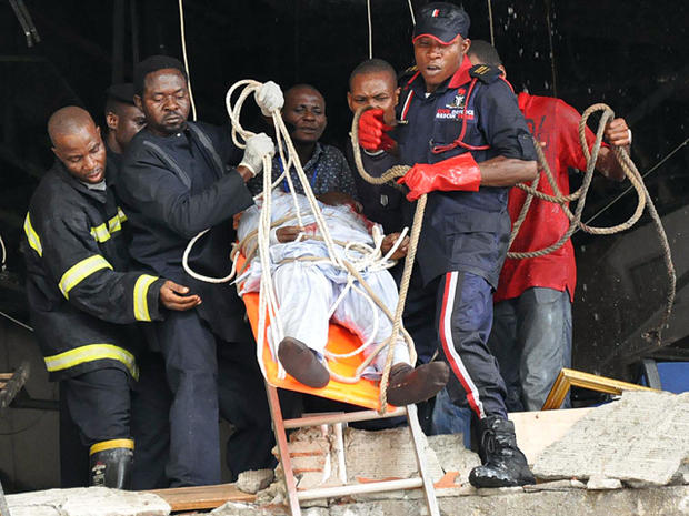Rescue workers evacuate a wounded man  
