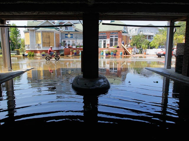 Flood water begins to recede along Queen Elizabeth Avenue  