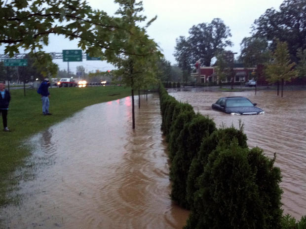 A supermarket parking lot is flooded with rain water from Tropical Storm Irene in Bennington, Vt., Aug. 28, 2011. 