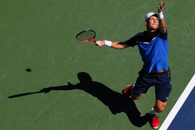 Tomas Berdych serves 