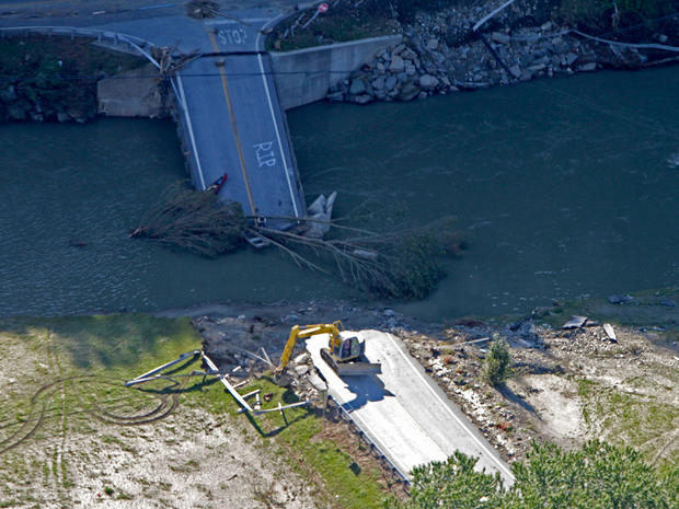 A bridge on Route 73 lies in the river in this aerial view on Tuesday, Aug. 30, 2011 in Rochester, Vt. 