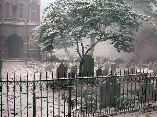 Ash covers gravestones in Trinity Church 