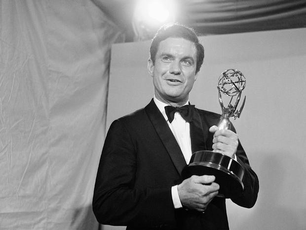 Actor Cliff Robterson poses with the Emmy he won for his role in "PT 109" 