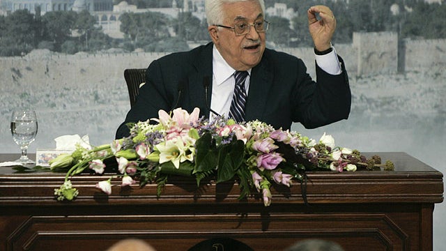 Palestinian President Mahmoud Abbas gestures as he talks in the West Bank city of Ramallah, Sept. 16, 2011. 