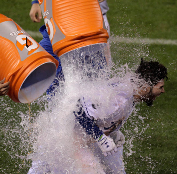 Eric Hosmer is doused by teammates 