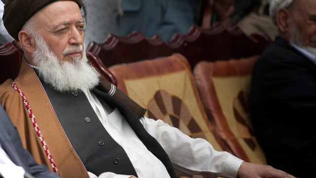 Former Afghan President Burhanuddin Rabbani attends a ceremony with local officials as more than 100 members of the Taliban surrender themselves to the Afghan government Aug. 26, 2011, in Badakhshan, Afghanistan. 