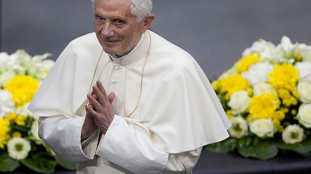 Pope Benedict XVI reacts to the members of parliament after he held a speech at the German parliament Bundestag in Berlin, Germany, Sept. 22, 2011.  