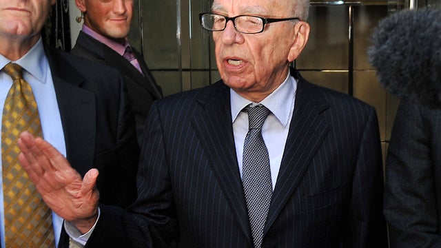 News Corporation Chief Rupert Murdoch speaks to the media after meeting the family of murdered British school girl and phone-hacking target Milly Dowler in London July 15, 2011. 