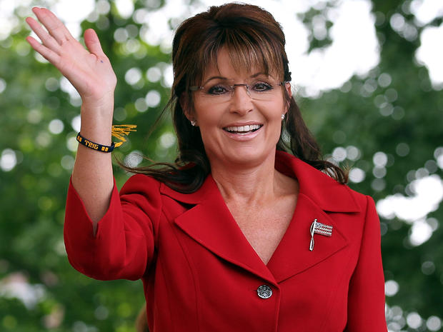Former Alaska Gov. Sarah Palin waves during a Tea Party Express rally Sept. 5, 2011, in Manchester, N.H. 