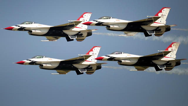 F-16 fighter jets from the U.S. Air Force Thunderbirds squadron fly over Kogalniceanu airport in Romania June 8, 2011. 