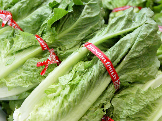 Heads of romaine lettuce fill a produce case at the Fruit Barn produce store in San Francisco. 