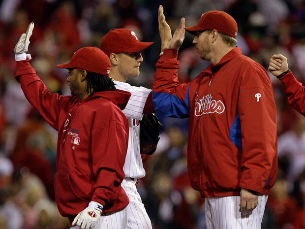 Roy Halladay celebrates with teammate Hunter Pence 