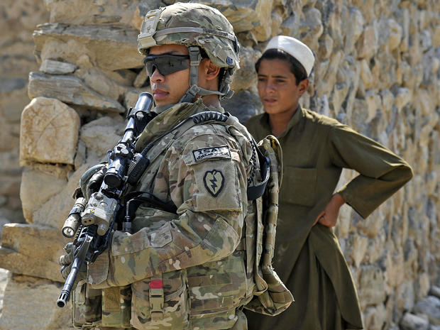 U.S. Army Sgt. Vu Nhon keeps watch Sept. 30, 2011, during a mission in the border-crossing town of Turkham Nangarhar, Afghanistan, near the border with Pakistan. 
