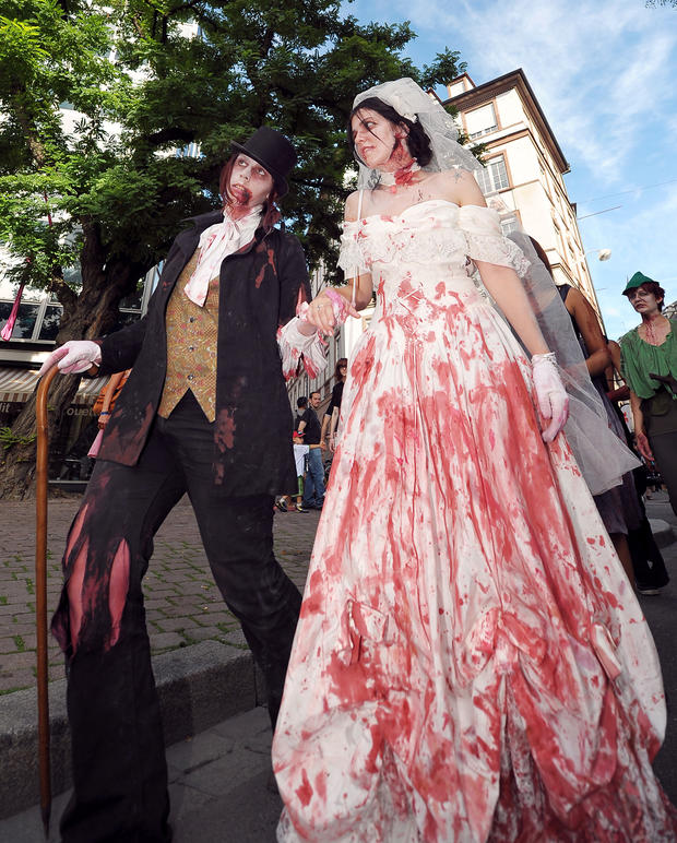 People dressed up as zombies take part i 