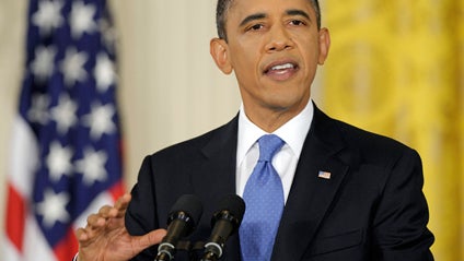 President Barack Obama gestures during a news conference in the East Room of the White House in Washington, Thursday, Oct. 6, 2011. 