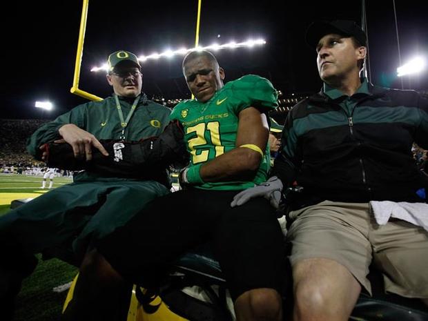 EUGENE, OR - OCTOBER 06: LaMichael James #21 of the Oregon Ducks is carted off after injuring his arm against the California Golden Bears on October 6, 2011 at the Autzen Stadium in Eugene, Oregon. (Photo by Jonathan Ferrey/Getty Images) 