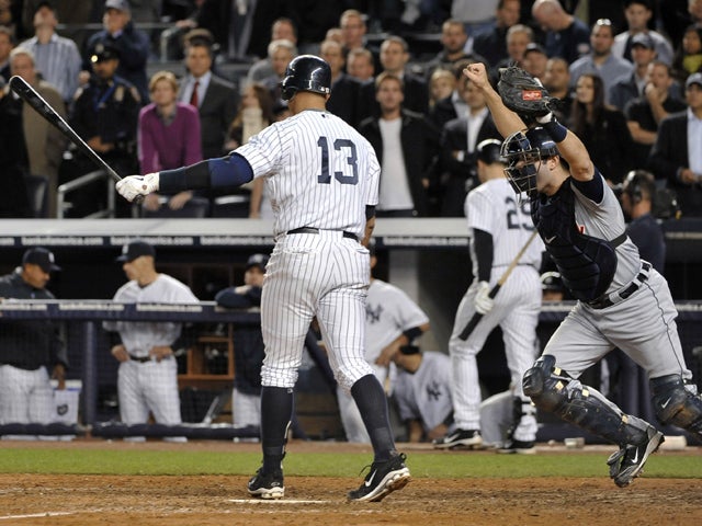 Alex Avila celebrates after Alex Rodriguez struck out 