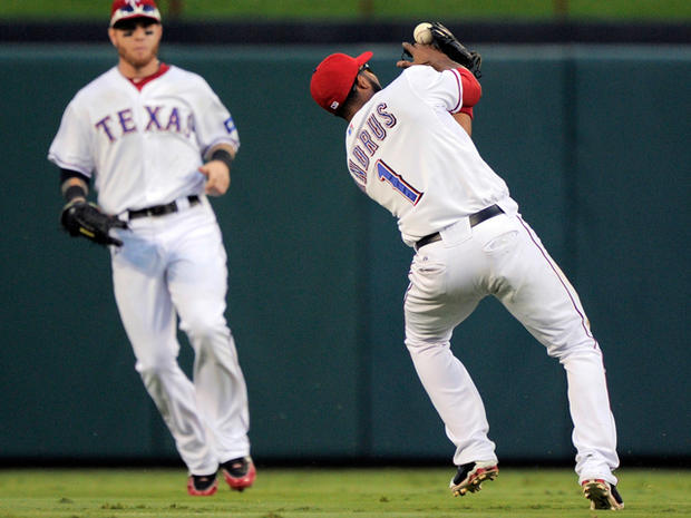 Elvis Andrus catches a fly ball 