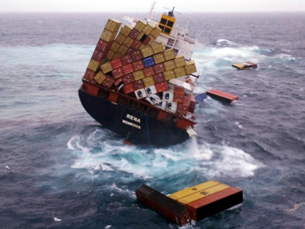 Shipping containers float Oct. 12, 2011, in the water around the cargo ship Rena that has been foundering since it ran aground Oct. 5, 2011, on the Astrolabe Reef about 14 miles from Tauranga Harbour, New Zealand, in this photo provided by Maritime New Ze 