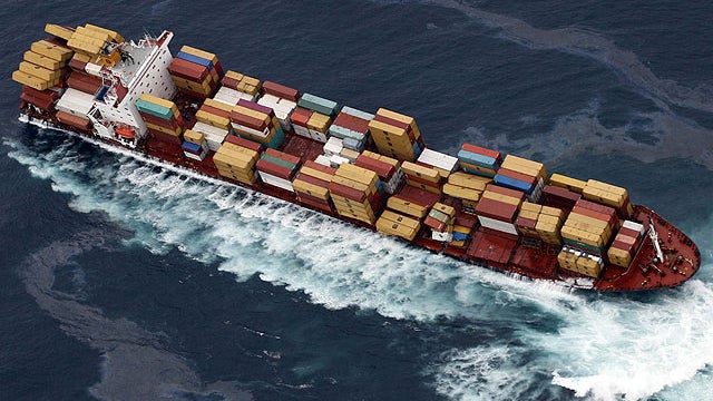 The Liberian-flagged container ship Rena is seen stuck aground on a reef off the coast of Tauranga, New Zealand, Oct. 13, 2011.  
