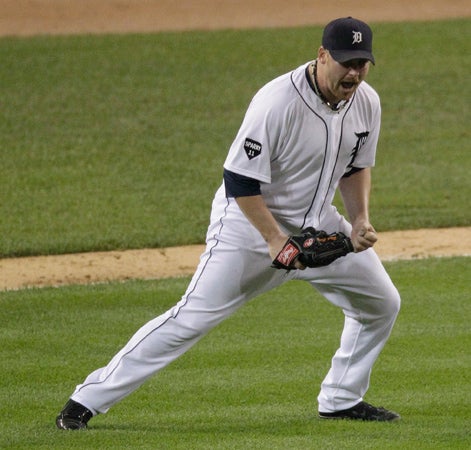 Phil Coke reacts after the final out  