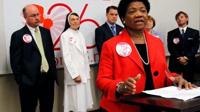 Dr. Freda Bush, a Jackson, Miss., obstetrician-gynecologist, is flanked at a news conference in Clinton, Miss., Sept. 8, 2011, by other supporters of an amendment to the state's constitution declaring that life begins when a human egg is fertilized. Suppo 