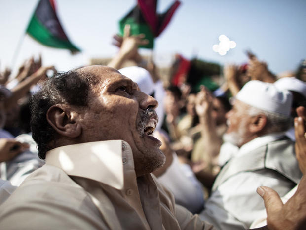 Libyans celebrate after the Friday prayers 