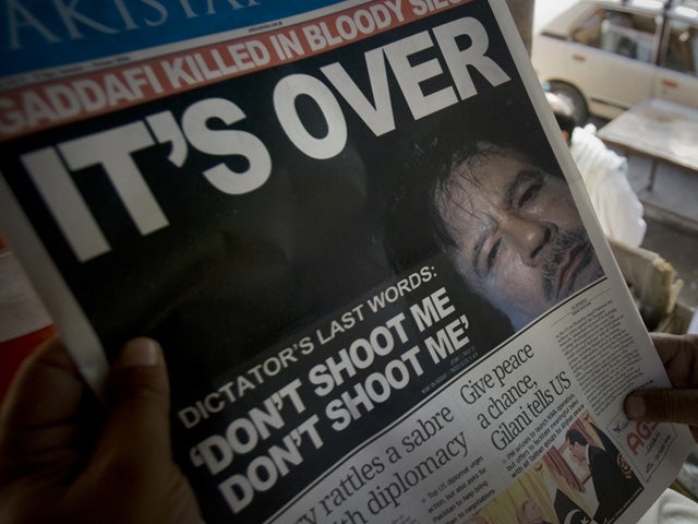 Muammar Qaddafi on front page 