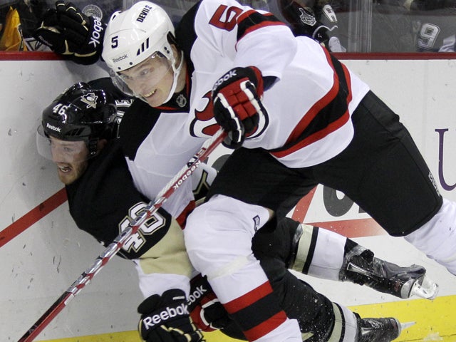 Joe Vitale is checked into the boards 