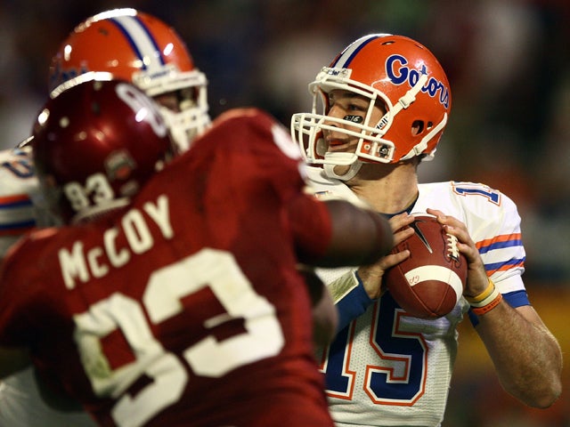 Tim Tebow looks to pass 