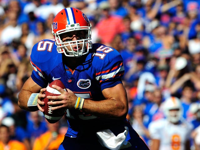 Tim Tebow scrambles for yardage 