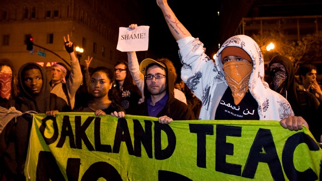 Occupy Wall Street protesters yell towards police 