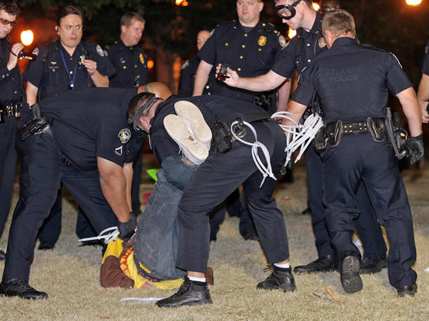 Police making one of dozens of arrests of Occupy Atlanta protesters in Woodruff Park early Wednesday morning 