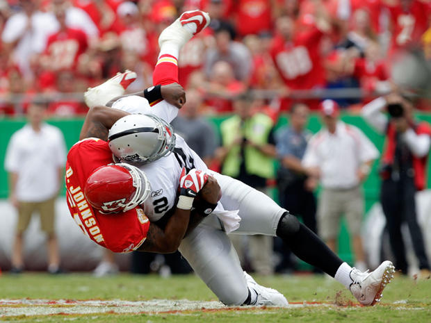 JaMarcus Russell is sacked by linebacker Derrick Johnson  