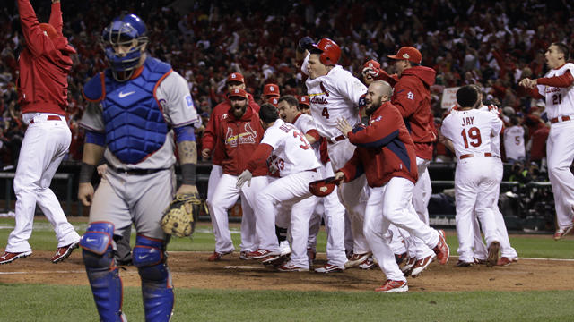 St. Louis Cardinals celebrate after David Freese hit a walk-off home 
