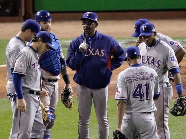 ST LOUIS, MO - OCTOBER 27: Manager Ron Washington of the Texas Rangers stands on the mound after removing Colby Lewis #48 in the sixth inning during Game Six of the MLB World Series against the St. Louis Cardinals at Busch Stadium on October 27, 2011 in St Louis, Missouri. (Photo by Rob Carr/Getty Images) 