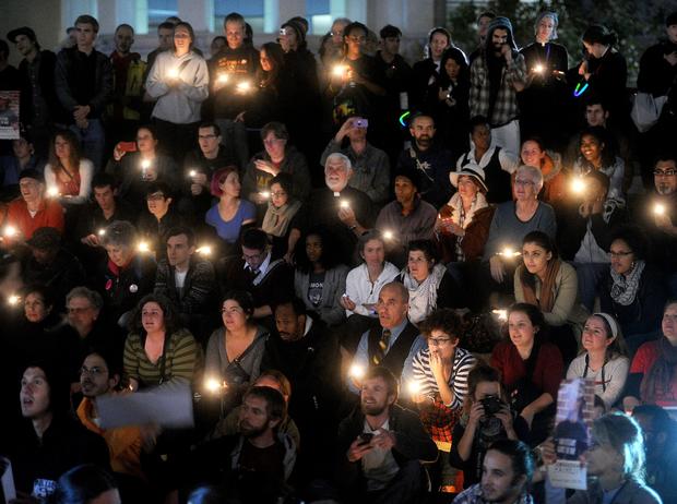 More than 1,000 people attended candlelight vigil for Scott Olsen Ghursday in Oakland 