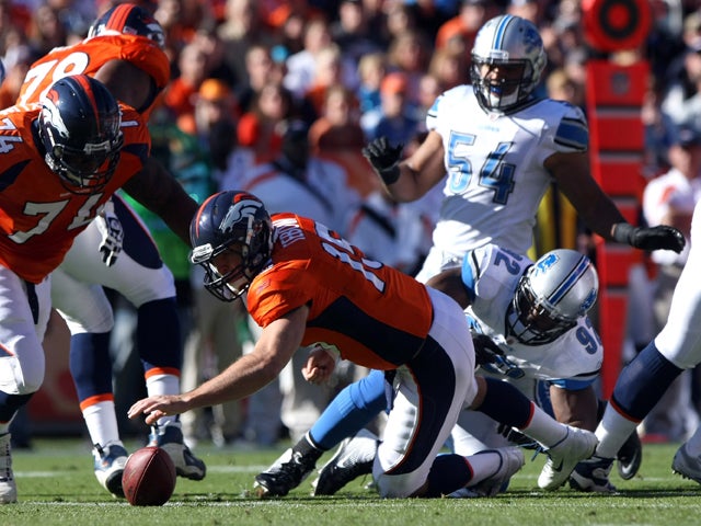 Cliff Avril sacks Tim Tebow  